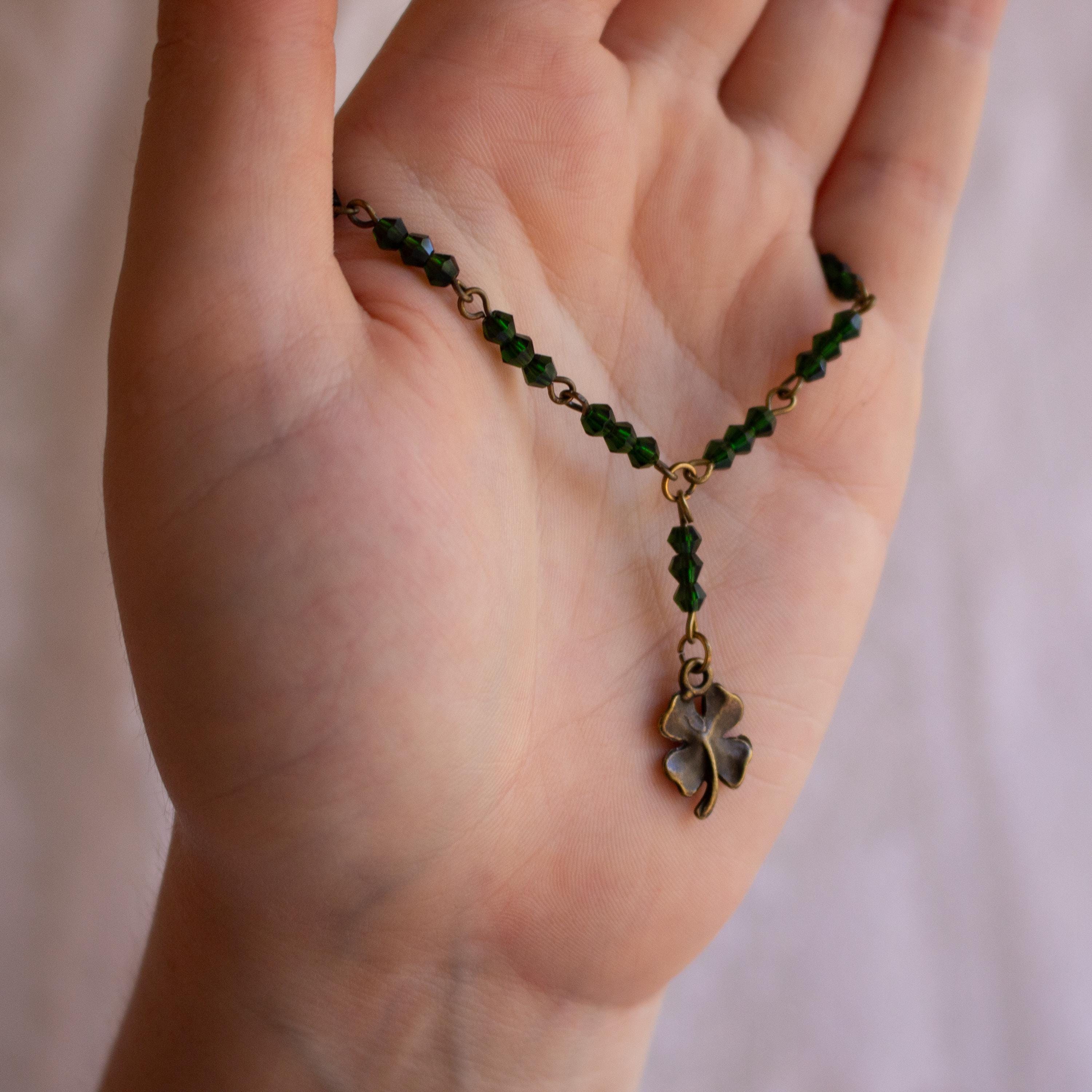 Vintage Inspired Rosary Style Bracelet with Green Glass Beads and Four-Leaf Clover Pendant