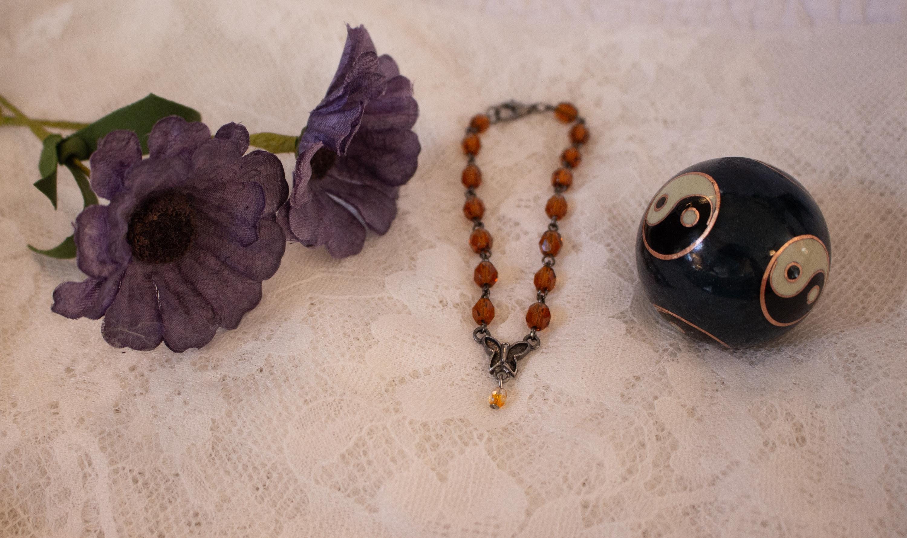 Vintage-Inspired Orange Glass Bead Bracelet with Butterfly Pendant