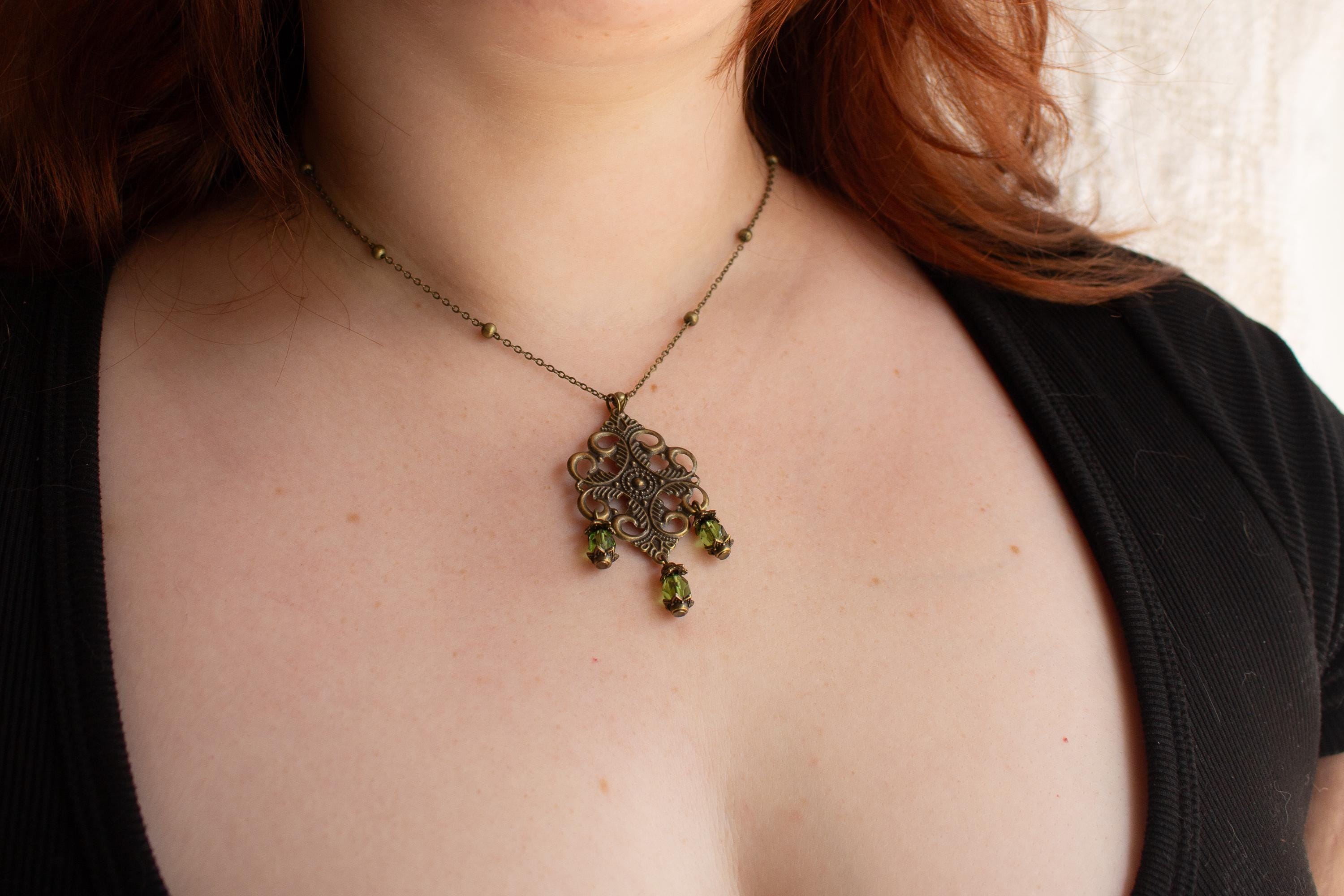 Vintage-Inspired Bronze Filigree Pendant With Green Glass Beads
