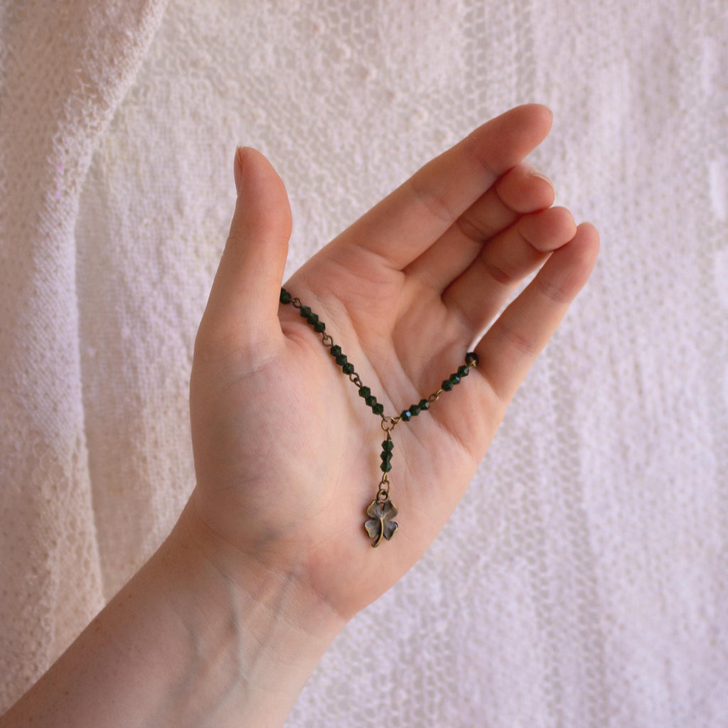 Vintage Inspired Rosary Style Bracelet with Green Glass Beads and Four-Leaf Clover Pendant