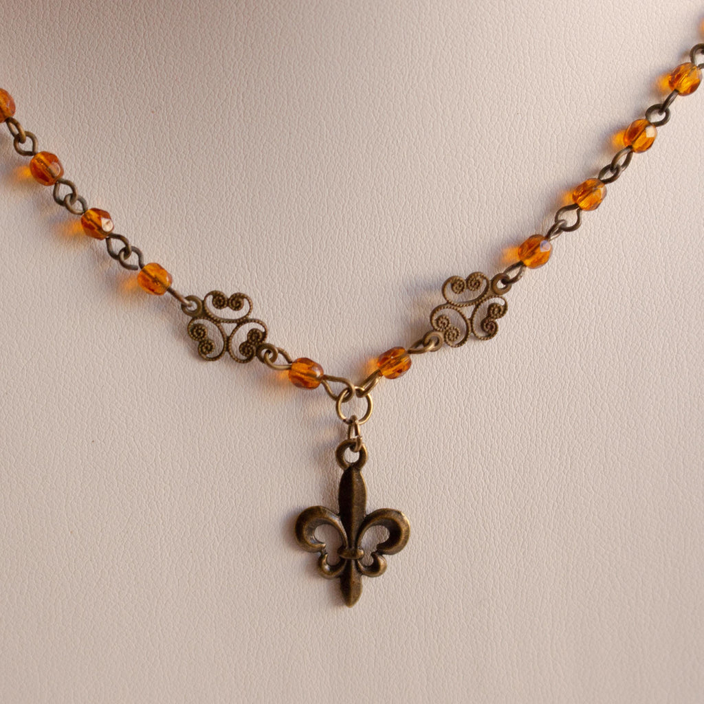 Fleur-de-Lis Beaded Necklace – Vintage Inspired Handmade Pendant with Bronze Filigree