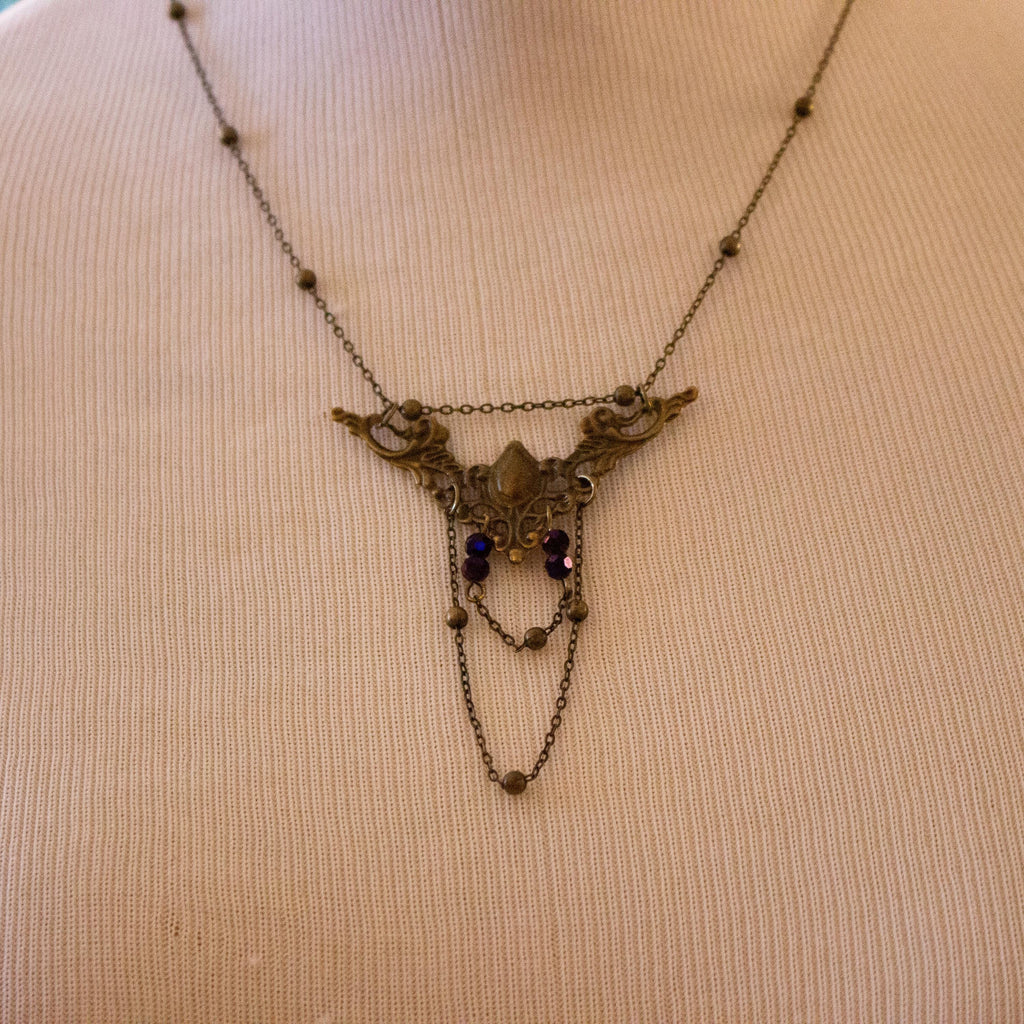 Vintage Art Nouveau Inspired Bronze Filigree Necklace with Two Chain Loops and Dark Purple Reflective Beads