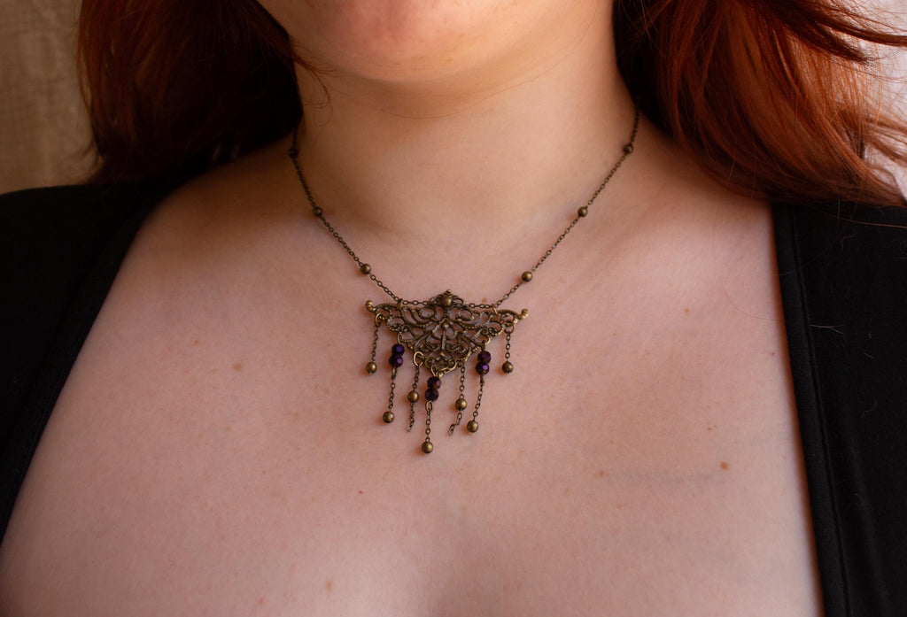 Vintage Art Nouveau Inspired Bronze Filigree Necklace with Chain and Dark Purple Reflective Bead Drops