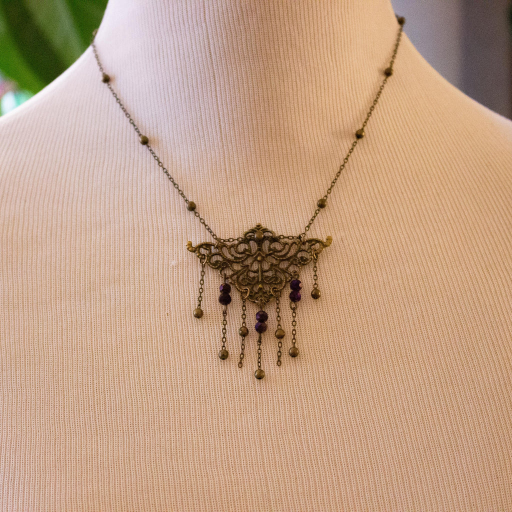 Vintage Art Nouveau Inspired Bronze Filigree Necklace with Chain and Dark Purple Reflective Bead Drops