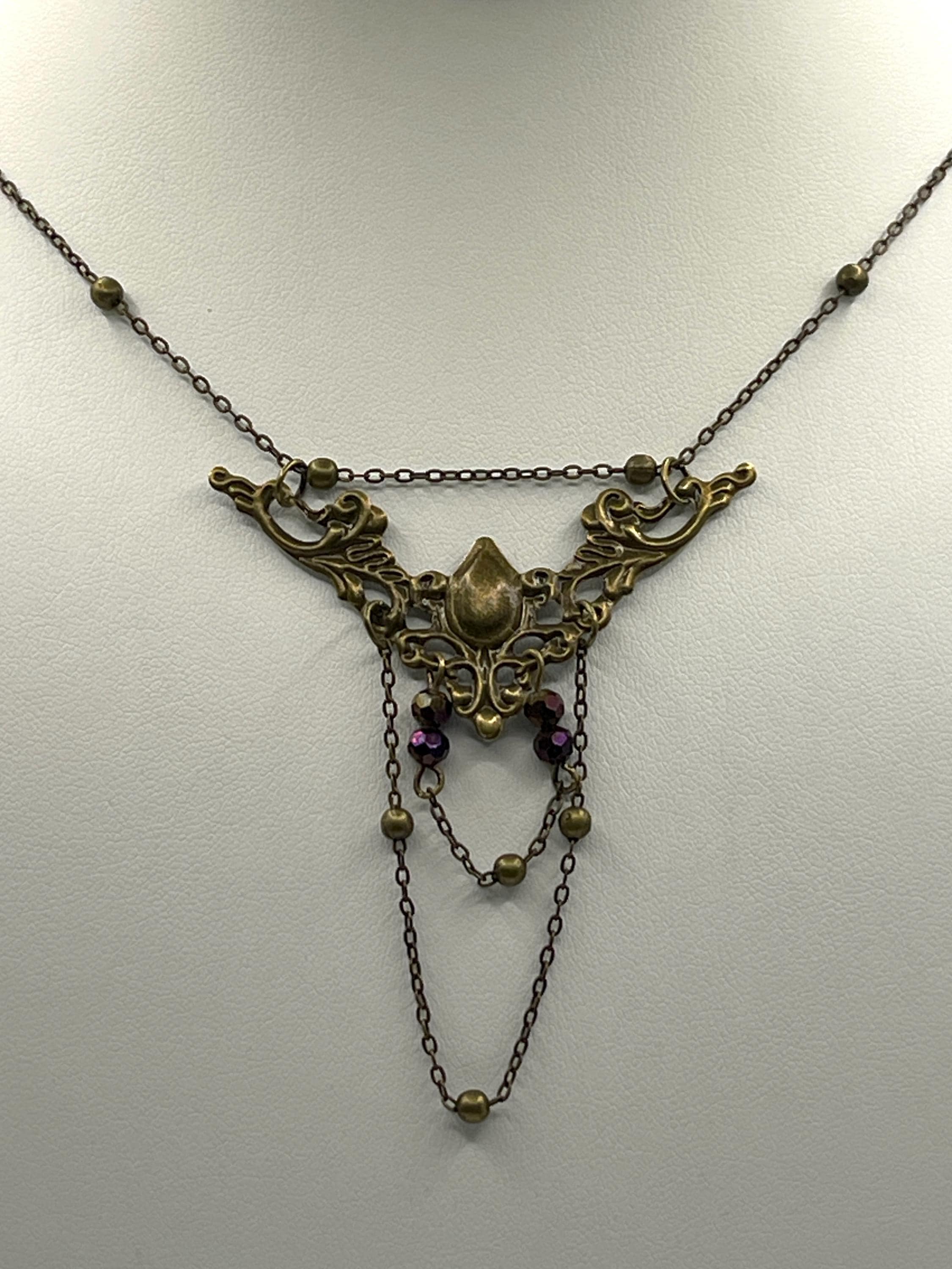 Vintage Art Nouveau Inspired Bronze Filigree Necklace with Two Chain Loops and Dark Purple Reflective Beads