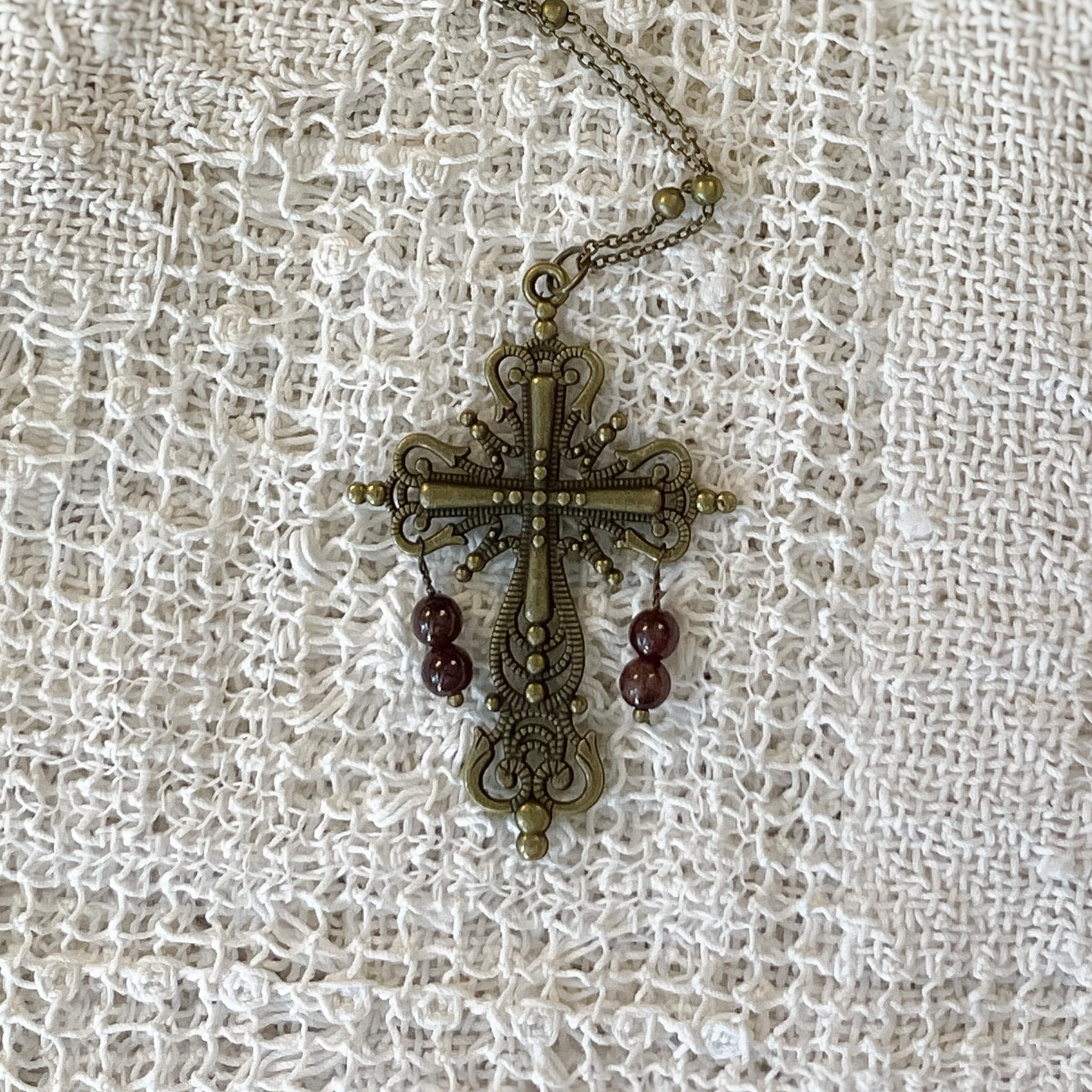 Vintage Inspired Bronze Cross Pendant Necklace With Garnet Bead Drops